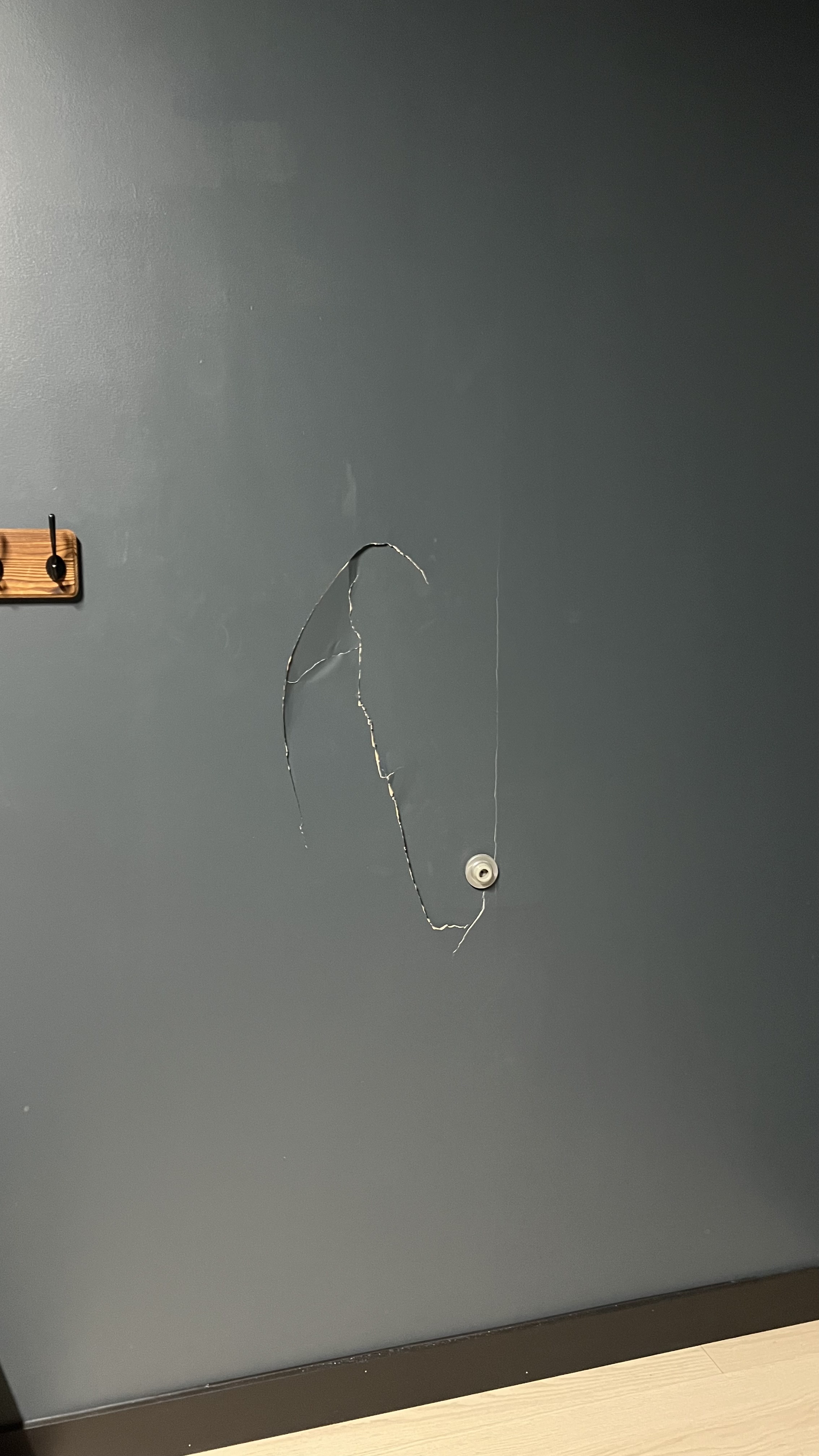 Before - Deep scratches and hole in drywall